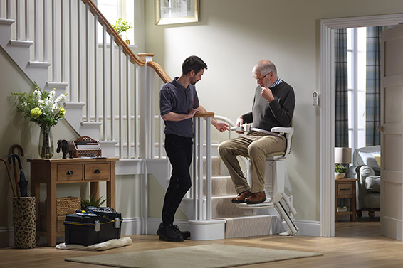 Senior on a Curved Stairlift