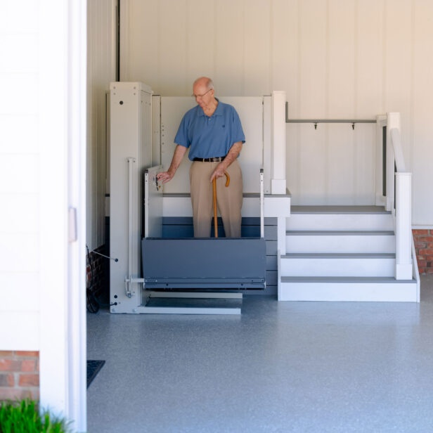 elderly man using a platform lift